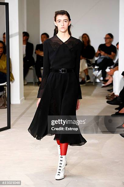 Model walks the runway during the Olivier Theysen show as part of the Paris Fashion Week Womenswear Spring/Summer 2017 on September 27, 2016 in...