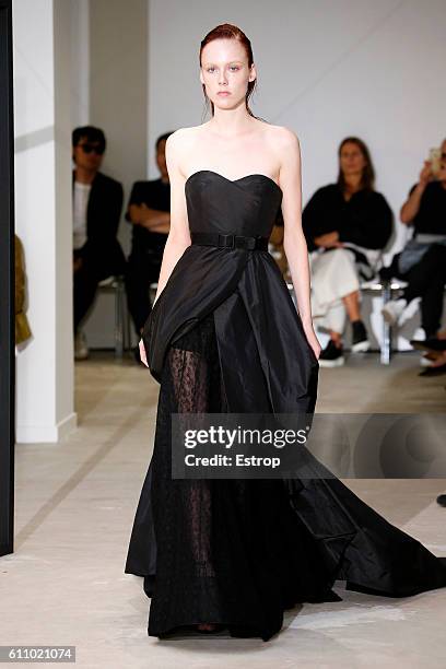 Model walks the runway during the Olivier Theysen show as part of the Paris Fashion Week Womenswear Spring/Summer 2017 on September 27, 2016 in...