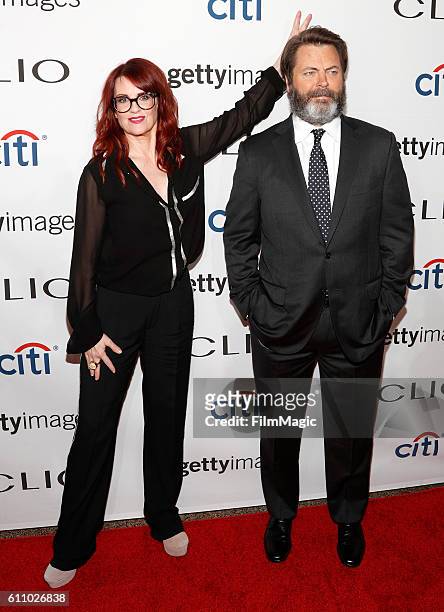 Actors Megan Mullally and Nick Offerman attend the 2016 Clio Awards at the American Museum of Natural History on September 28, 2016 in New York City.