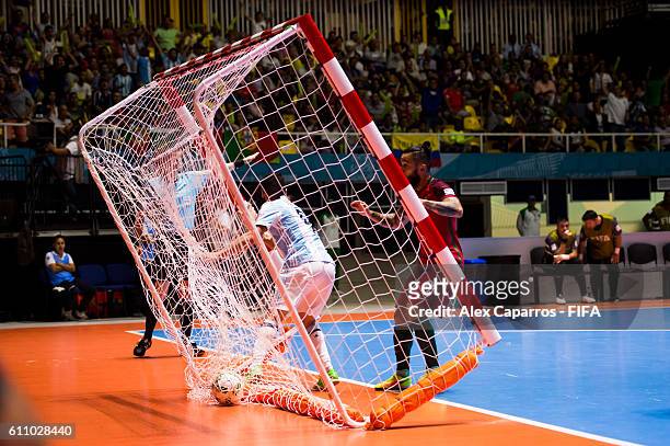 Cristian Borruto of Argentina scores the opening goal during the FIFA Futsal World Cup Semi-Final match between Argentina and Portugal at the Coliseo...