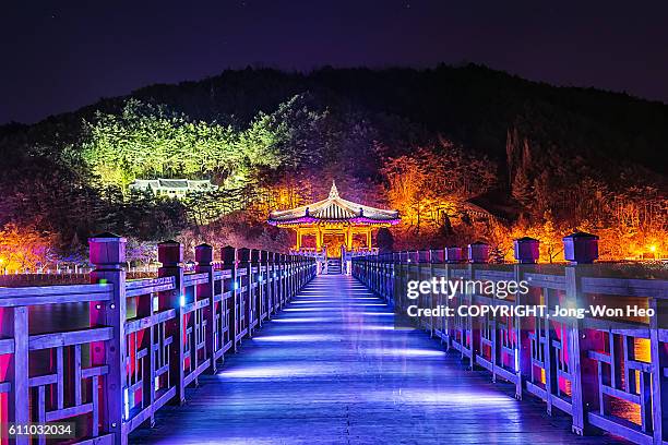 a bridge toward the gazebo - korea tradition stock pictures, royalty-free photos & images