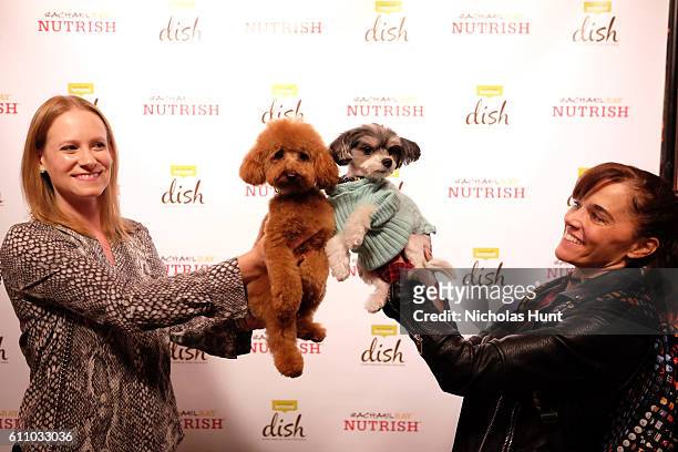 Chase and Tinkerbelle attend the celebration of the launch of Rachael Ray's Nutrish DISH with a Puppy Party on September 28, 2016 in New York City.