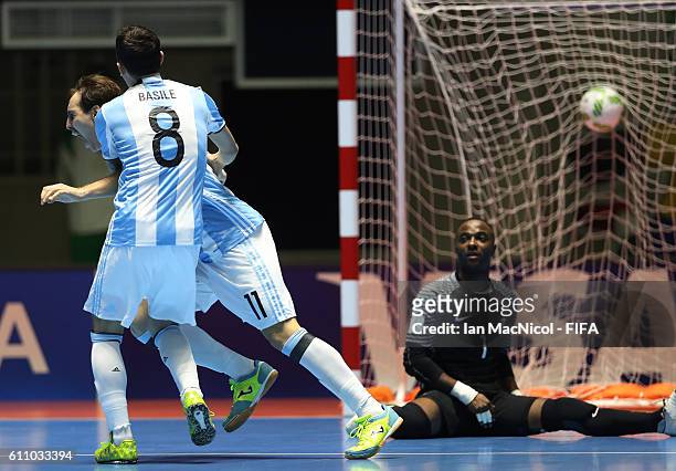 Alan Brandi of Argentina celebrates after he scows his teams fourth goal after he scores during the FIFA Futsal World Cup Semi Final match between...