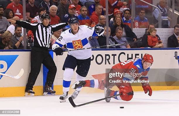 Jori Lehtera of Team Finland collides with Vladimir Tarasenko of Team Russia during the World Cup of Hockey 2016 at Air Canada Centre on September...