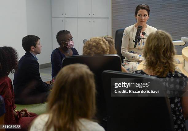Crown Princess Mary of Denmark speak to children during a visit to Children's National Medical Center on September 28, 2016 in Washington, DC.