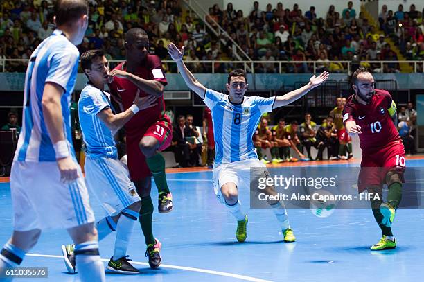 Ricardinho of Portugal shoots the ball during the FIFA Futsal World Cup Semi-Final match between Argentina and Portugal at the Coliseo El Pueblo...