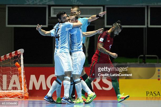 Cristian Borruto of Argentina celebrates with teammates after scoring during a semi final match between Argentina and Portugal as part of 2016 FIFA...