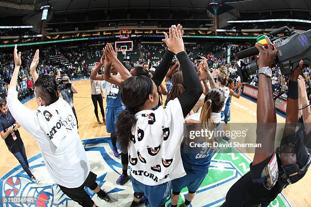 The Minnesota Lynx wave to the crowd after the game against the Phoenix Mercury in Game One of the Semifinals during the 2016 WNBA Playoffs on...