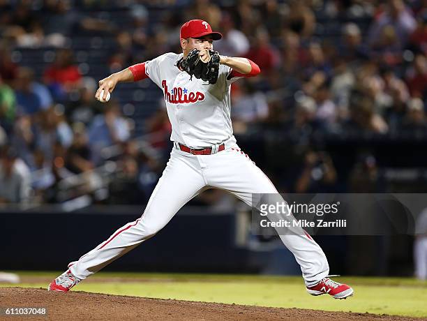 Jeanmar Gomez of the Philadelphia Phillies throws a pitch in the eighth inning during the game against the Atlanta Braves at Turner Field on...