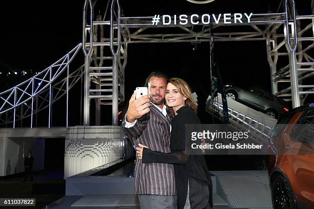 Stephan Luca and Anja Kling make a selfie during the world premiere of the all-new Land Rover Discovery at Packington Hall park on September 28, 2016...