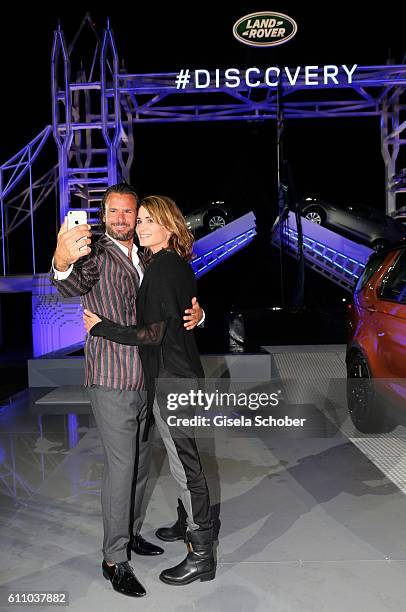 Stephan Luca and Anja Kling make a selfie during the world premiere of the all-new Land Rover Discovery at Packington Hall park on September 28, 2016...