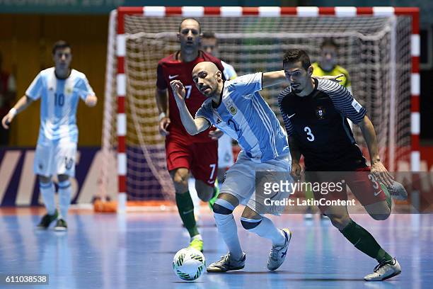 Damian Stazzone of Argentina vies for the ball with Bruno Coelho of Portugal during a semi final match between Argentina and Portugal as part of 2016...