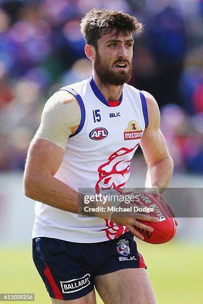 Tom Campbell of the Bulldogs looks upfield during the Western Bulldogs AFL media opportunity and training session at Whitten Oval on September 29,...