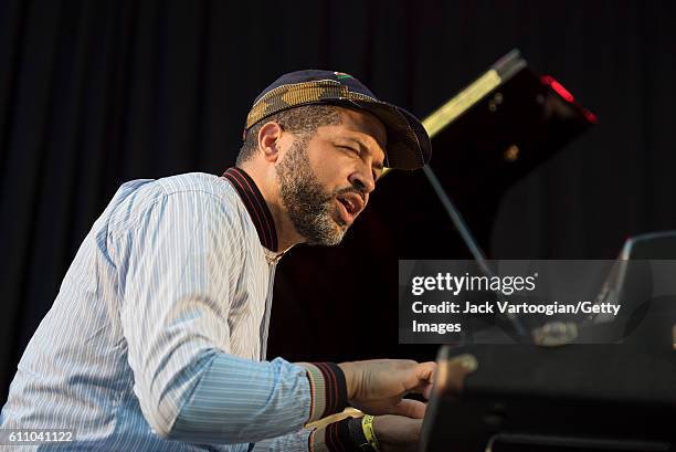 American musician Jason Moran plays piano at the 24th Annual Charlie Parker Jazz Festival in Tompkins Square Park, New York, New York, August 28,...