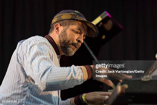 American musician Jason Moran plays piano at the 24th Annual Charlie Parker Jazz Festival in Tompkins Square Park, New York, New York, August 28,...