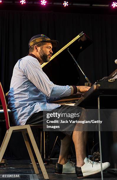 American musician Jason Moran plays piano at the 24th Annual Charlie Parker Jazz Festival in Tompkins Square Park, New York, New York, August 28,...