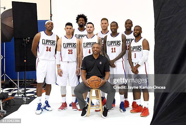 Paul Pierce, Austin Rivers, DeAndre Jordan, J.J. Redick, head coach Doc Rivers, Blake Griffin, Jamal Crawford, Luc Mbah A Moute and Chris Paul of the...