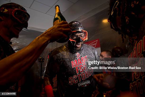 David Ortiz of the Boston Red Sox celebrates after clinching the American League East Division after a game against the New York Yankees on September...