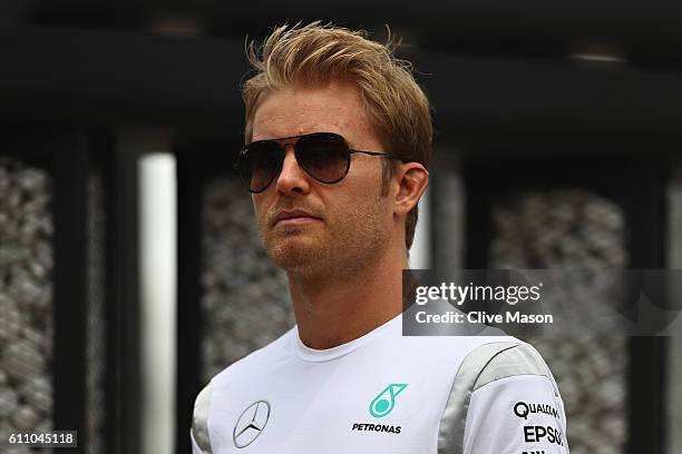 Nico Rosberg of Germany and Mercedes GP walks in the Paddock during previews for the Malaysia Formula One Grand Prix at Sepang Circuit on September...