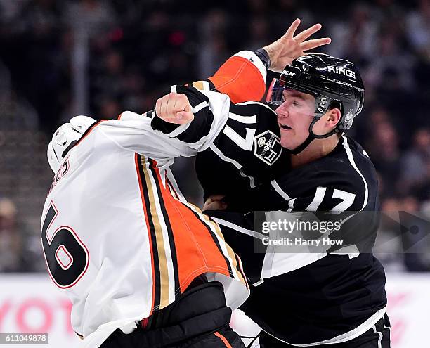 Michael Latta of the Los Angeles Kings fights Simon Despres of the Anaheim Ducks during the third period of a preseason game at Staples Center on...