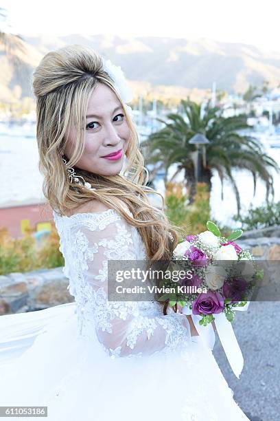Alice Aoki arrives at her wedding ceremony at the Avalon Theater on September 25, 2016 on Catalina Island, California.