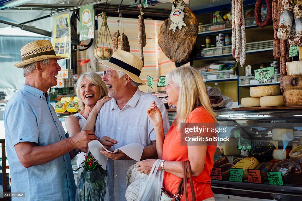 Mature Couples Shopping in an Italian Delicatessen