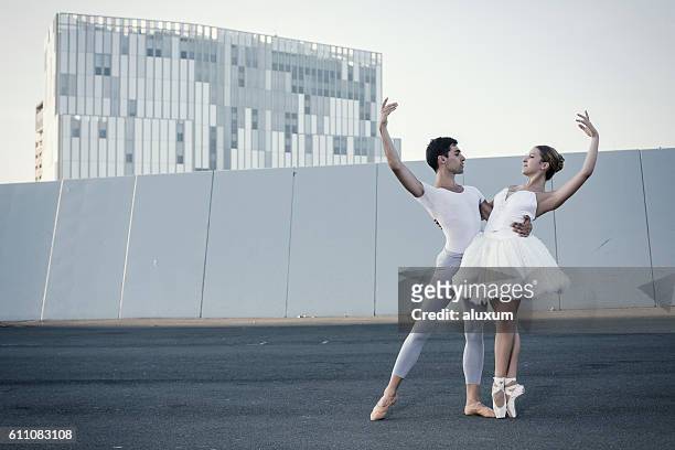 ballet dancers performance in the city - ballerina stockfoto's en -beelden