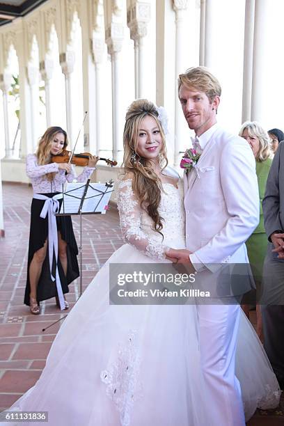 Alice Aoki and Justin Moore marry at the Avalon Ballroom on September 25, 2016 in Catalina Island, California.