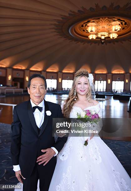 Dr Kaneko and Alice Aoki attend the Aoki wedding ceremony at the Avalon Ballroom on September 25, 2016 on Catalina Island, California.