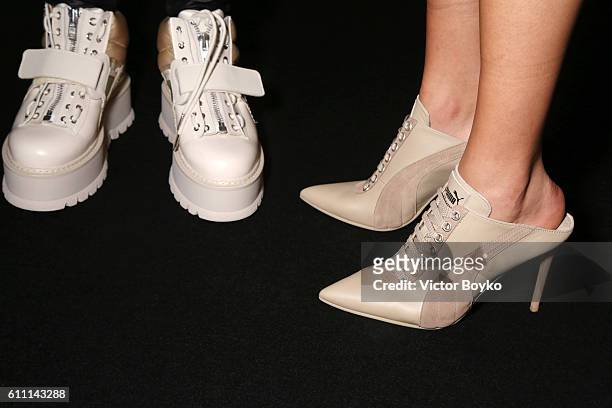 Model, shoe detail, is seen backstage during FENTY x PUMA by Rihanna at Hotel Salomon de Rothschild on September 28, 2016 in Paris, France.