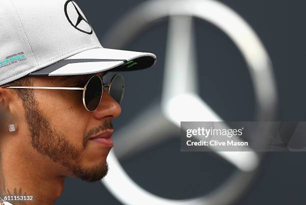 Lewis Hamilton of Great Britain and Mercedes GP in the Paddock during previews for the Malaysia Formula One Grand Prix at Sepang Circuit on September...