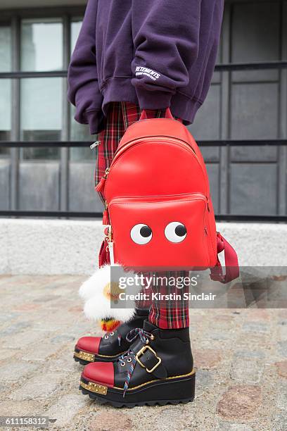 Fashion consultant Blanca Miro wears Vetements top, vintage trousers, Prada shoes and Anya Hindmarch bag on day 3 of London Womens Fashion Week...