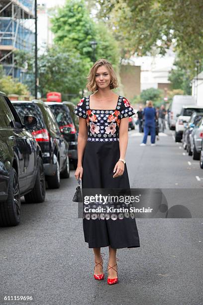 Model Arizona Muse wears a Temperley dress on day 3 of London Womens Fashion Week Spring/Summer 2017, on September 18, 2016 in London, England.