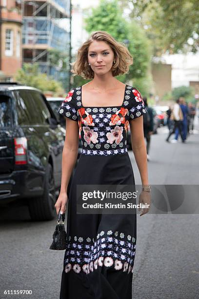 Model Arizona Muse wears a Temperley dress on day 3 of London Womens Fashion Week Spring/Summer 2017, on September 18, 2016 in London, England.