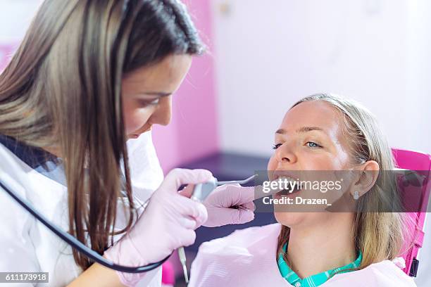 norwegian woman at dentist - human teeth stock pictures, royalty-free photos & images