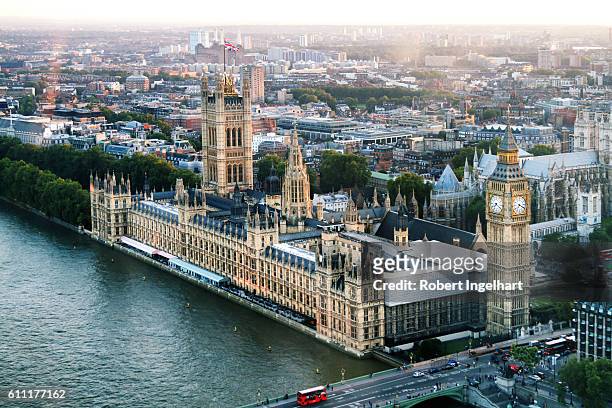 big ben and houses of parliament on river thames, dusk - uk stock pictures, royalty-free photos & images