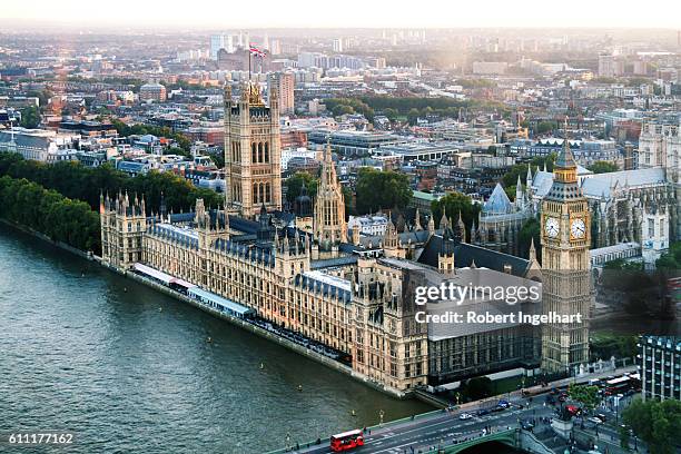 big ben and houses of parliament on river thames, dusk - parliament building bildbanksfoton och bilder