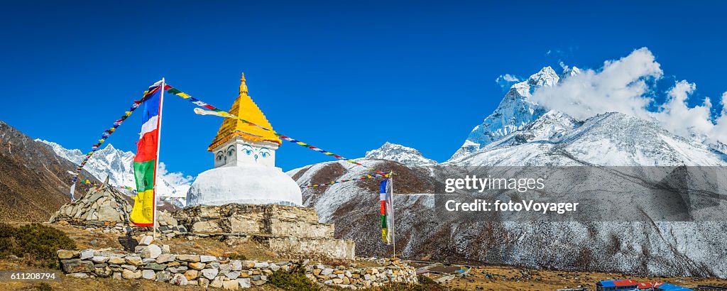 Buddhist prayer flags stupa shrine high in Himalayan mountains Nepal