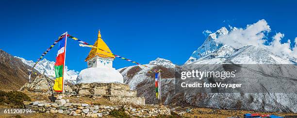 buddhist prayer flags stupa shrine high in himalayan mountains nepal - buddhist flag stock pictures, royalty-free photos & images