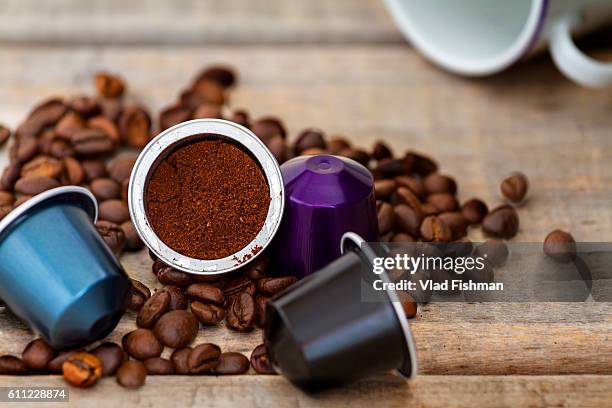 italian coffee capsules - coffee capsules stock pictures, royalty-free photos & images