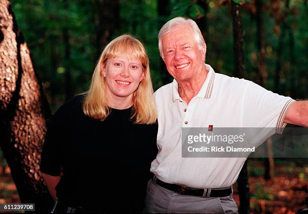 President Carter and Amy Carter photo shoot for their new children's book, "The Little Baby Snoogle-Fleejer," in Plains Georgia on August 21, 1995
