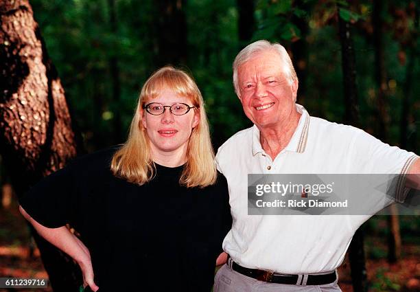 President Carter and Amy Carter photo shoot for their new children's book, "The Little Baby Snoogle-Fleejer," in Plains Georgia on August 21, 1995