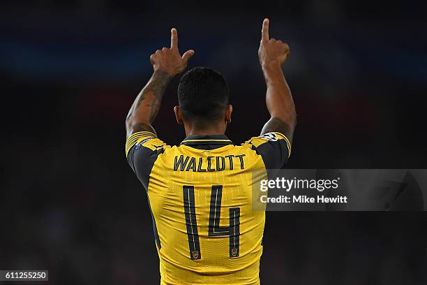 Theo Walcott of Arsenal celebrates his second goal during the UEFA Champions League Group A match between Arsenal FC and FC Basel 1893 at Emirates...