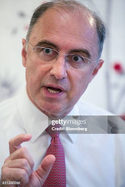 Xavier Rolet, chief executive officer of London Stock Exchange Group Plc , gestures as he speaks during an interview in London, U.K., on Thursday,...