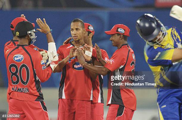 Lendl Simmons of Trinidad celebrates the wicket of Rory Kleinveldt of the Cobras during the Airtel Champions League Twenty20 Second Semi Final...