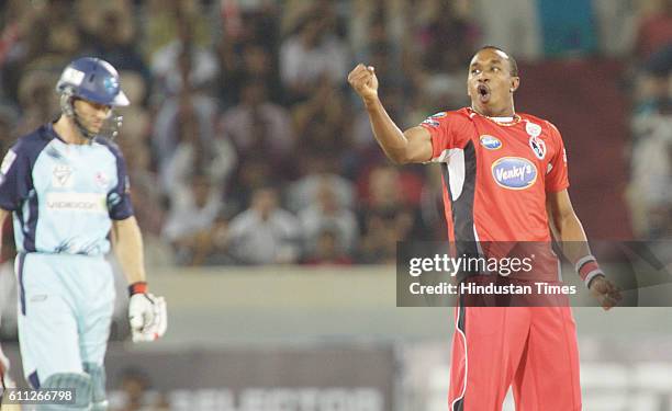 Dwayne Bravo of Trinidad celebrates the wicket of SM Katich of Blues during the Airtel Champions League Twenty20 Final between NSW Blues and Trinidad...