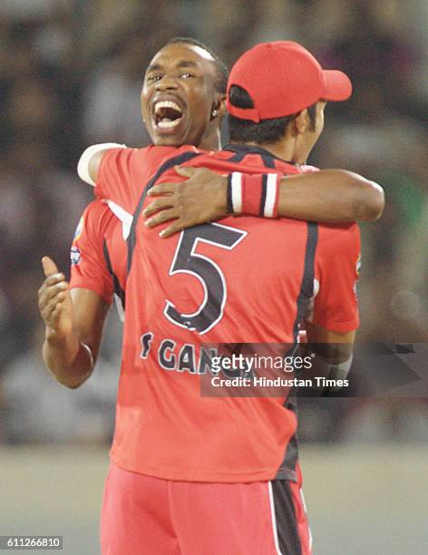 Dwayne Bravo of Trinidad celebrates the wicket of SM Katich of Blues during the Airtel Champions League Twenty20 Final between NSW Blues and Trinidad...