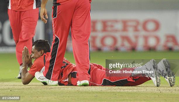 Dave Mohammed of Trinidad celebrates the wicket of Ben Rohrer of Blues during the Airtel Champions League Twenty20 Final between NSW Blues and...