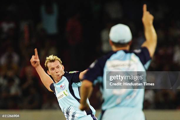 Blues bowler Brett Lee celebrates after taking the wicket of Lendl Simmons during the Airtel Champions League Twenty20 Final between NSW Blues and...