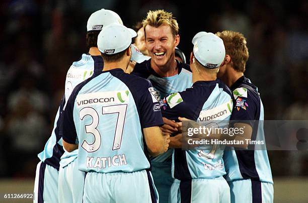 Blues bowler Brett Lee celebrates after taking the wicket of Lendl Simmons during the Airtel Champions League Twenty20 Final between NSW Blues and...